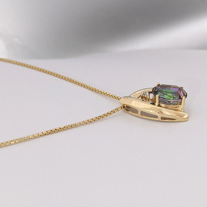10K MYSTIC TOPAZ OVAL 8X10 WITH MELEE ESTATE PENDANT & 14K CHAIN 5.9 GRAMS