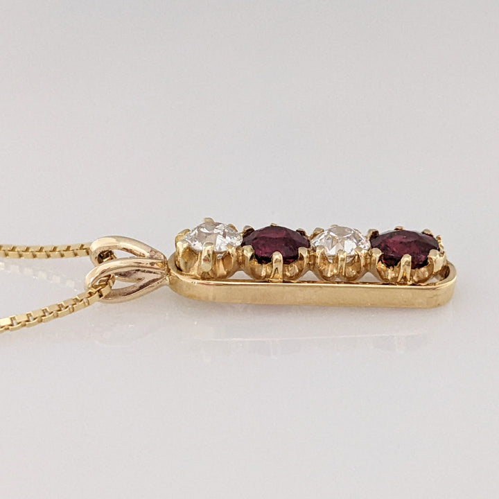 14K RUBY ROUND 4.5MM (2) DIAMOND ROUND (2) .46DTW ESTATE PENDANT & CHAIN 4.3 GRAMS