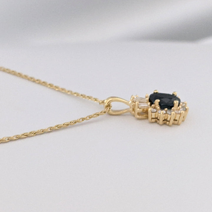 14K SAPPHIRE OVAL 4X5 WITH .25 DIAMOND TOTAL WEIGHT (3) BAGUETTE (10) ROUND ESTATE PENDANT & CHAIN 2.9 GRAMS
