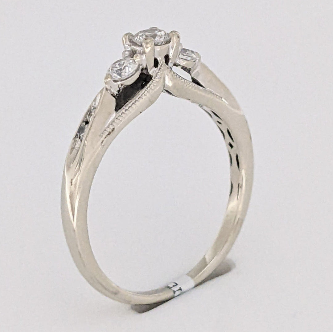 10K WHITE .32 CARAT TOTAL WEIGHT I1 H DIAMOND ROUND (7) ESTATE TRINITY RING 2.0 GRAMS