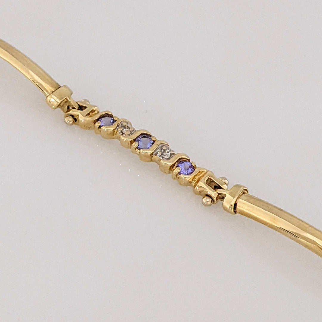 14K DIAMOND ROUND (6) .06CTW WITH (9) TANZANITE ROUND 2.5MM ESTATE BRACELET 8.1 GRAMS