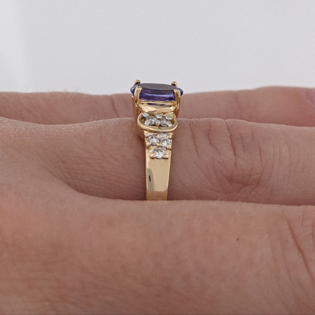 14K TANZANITE OVAL 5X7 WITH .10 DIAMOND TOTAL WEIGHT (10) ROUND ESTATE RING 3.2 GRAMS