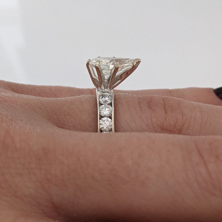 14K WHITE 2.39 CARAT TOTAL WEIGHT I1 K DIAMOND PEAR WITH (10) ROUND CHANNEL DIAMOND ESTATE RING 4.1 GRAMS
