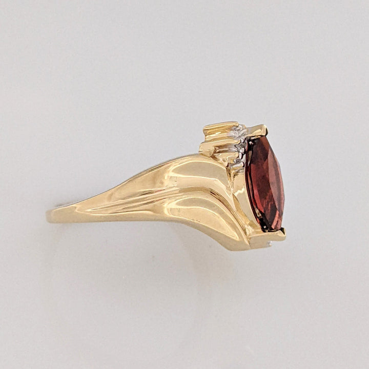 10K GARNET MARQUISE 5X10 WITH (2) MELEE ESTATE RING 2.7 GRAMS