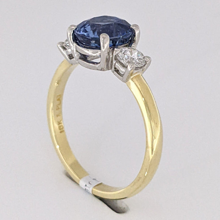 18K/PLATINUM CEYLON SAPPHIRE OVAL 7X8 WITH .45 DIAMOND TOTAL WEIGHT (2) ROUND ESTATE RING 4.3 GRAMS