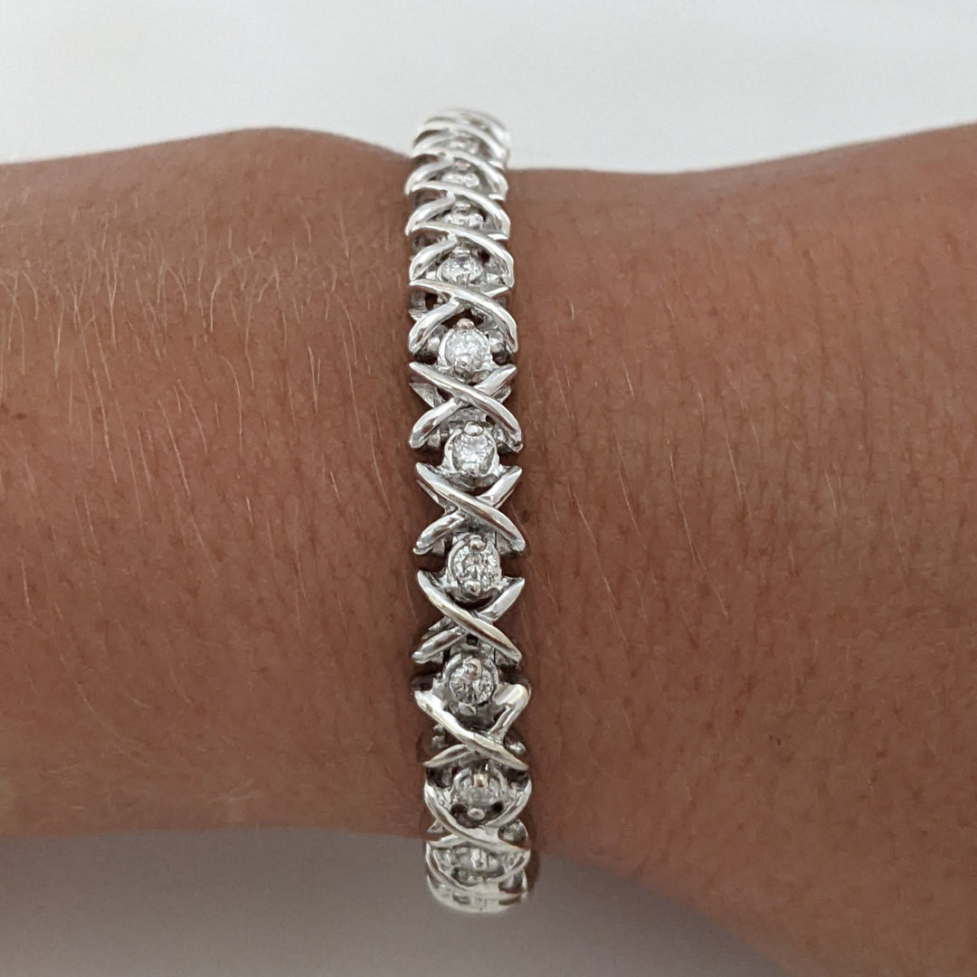 14K WHITE 1.28 CARAT TOTAL WEIGHT I1 I DIAMOND ROUND (32) "X" LINK ESTATE BRACELET 15.1 GRAMS