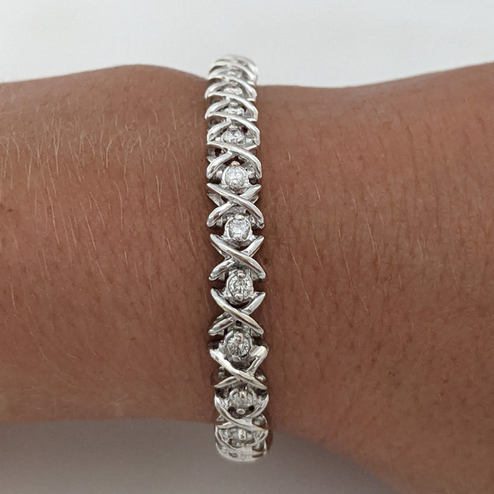 14K WHITE 1.28 CARAT TOTAL WEIGHT I1 I DIAMOND ROUND (32) "X" LINK ESTATE BRACELET 15.1 GRAMS