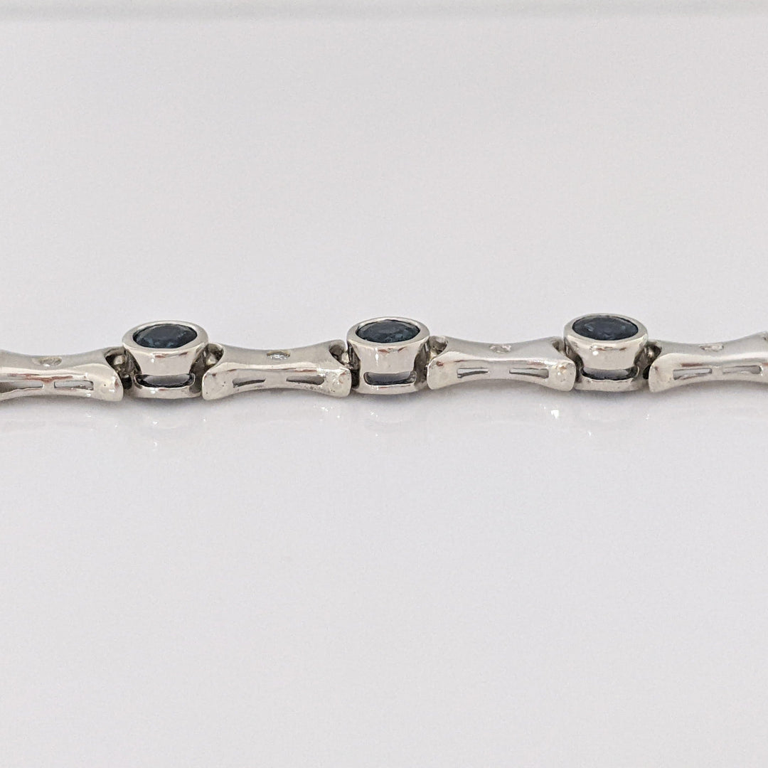 14K WHITE SAPPHIRE ROUND (14) 4MM BEZEL WITH .13 DIAMOND TOTAL WEIGHT ESTATE BRACELET 12.7 GRAMS