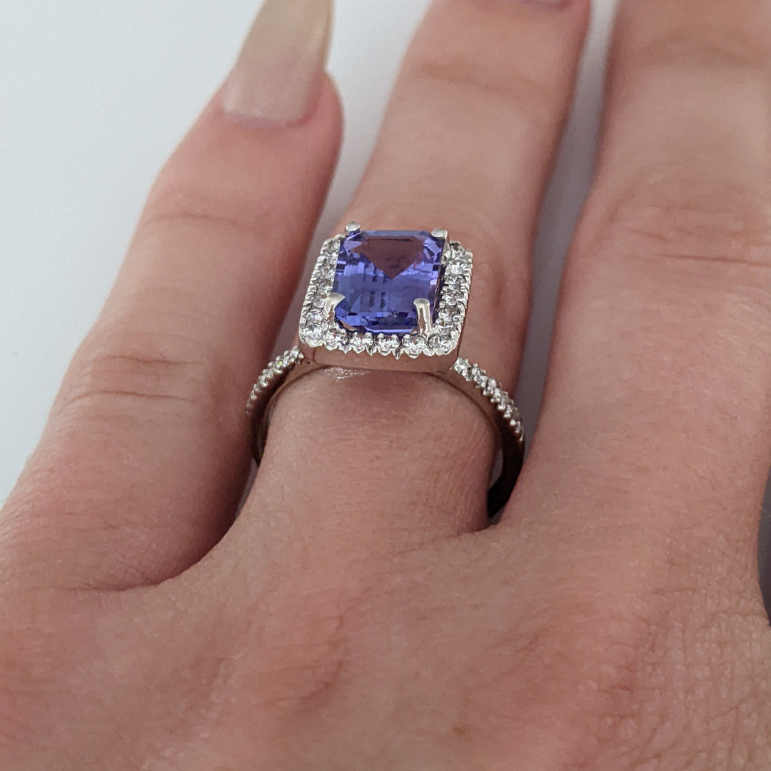14K WHITE TANZANITE "A" EMERALD CUT 6.5X8.6 WITH .48 DIAMOND TOTAL WEIGHT HALO ESTATE RING 3.3 GRAMS