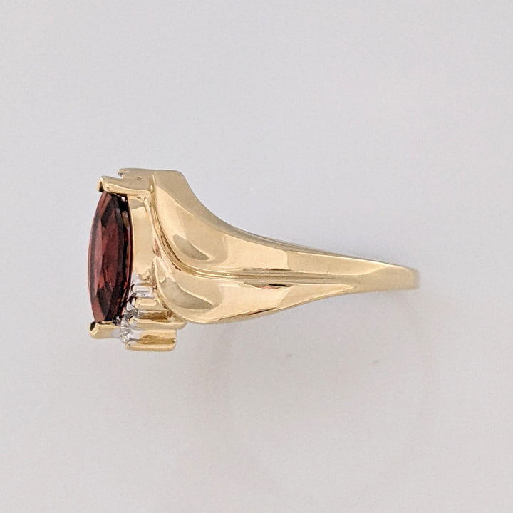 10K GARNET MARQUISE 5X10 WITH (2) MELEE ESTATE RING 2.7 GRAMS