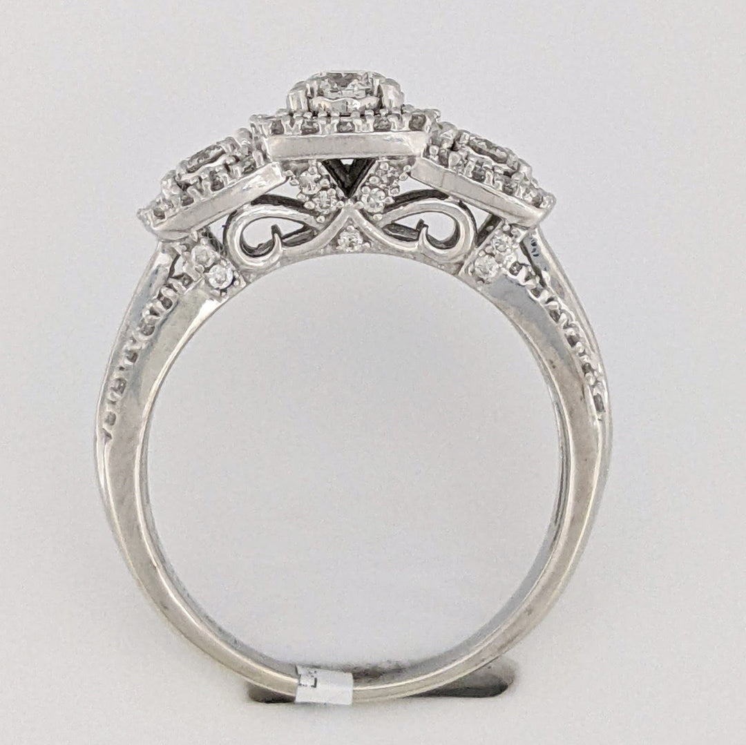 10K WHITE .81 CARAT TOTAL WEIGHT I1 I DIAMOND ROUND (83) BAGUETTE (18) ESTATE HALO TRINITY RING 5.2 GRAMS