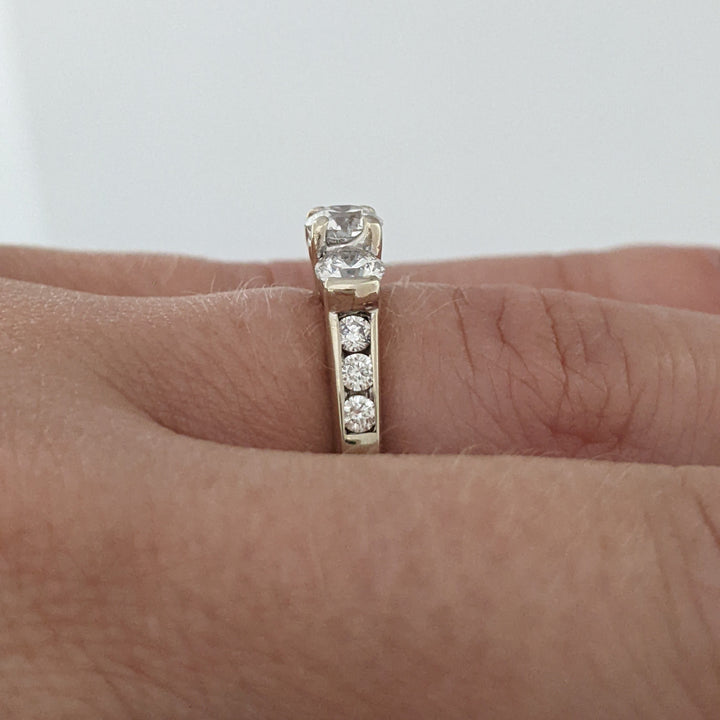 14K WHITE .83 CARAT TOTAL WEIGHT I1 H DIAMOND ROUND (9) ESTATE TRINITY RING 2.7 GRAMS