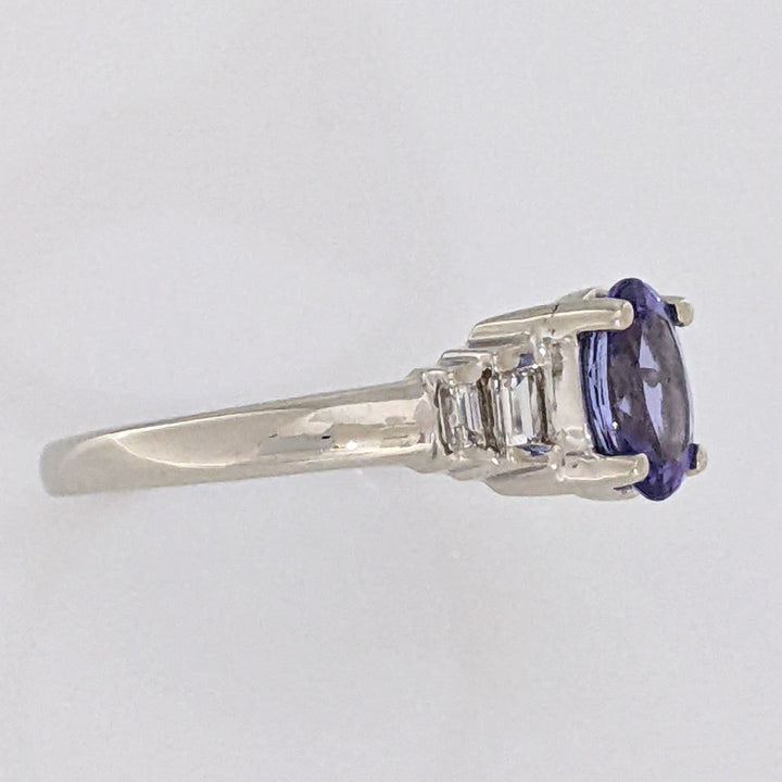 14K WHITE TANZANITE OVAL 5X7 WITH .18 DIAMOND TOTAL WEIGHT (4) EMERALD CUT ESTATE RING 2.2 GRAMS