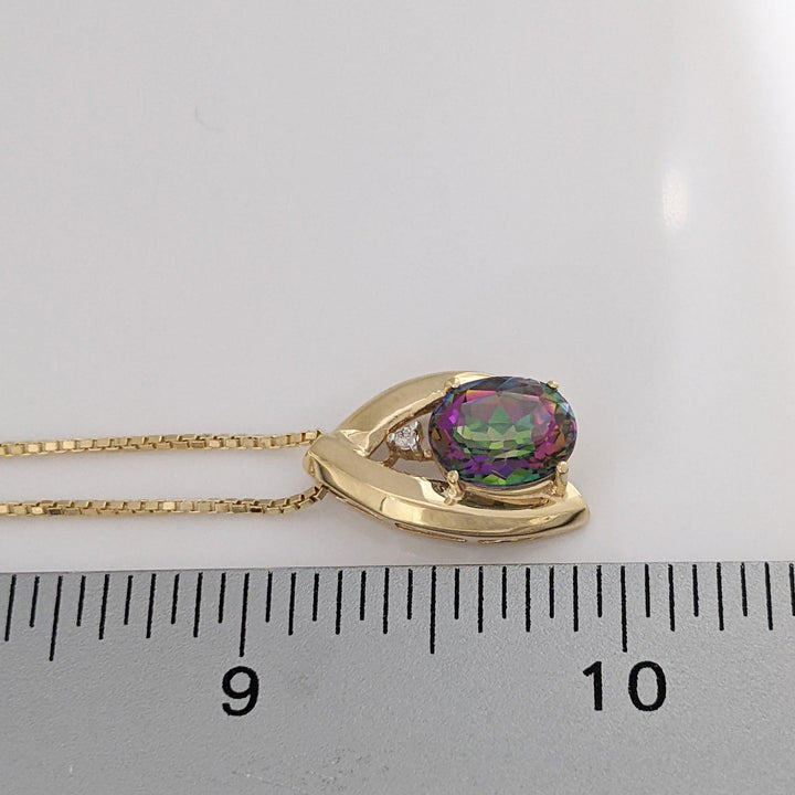 10K MYSTIC TOPAZ OVAL 8X10 WITH MELEE ESTATE PENDANT & 14K CHAIN 5.9 GRAMS