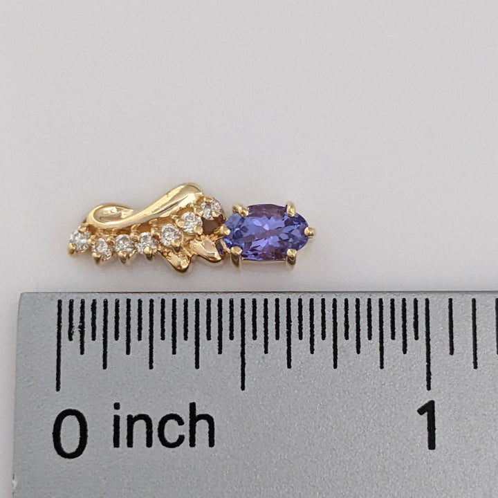 14K TANZANITE OVAL 4X6 WITH (14) MELEE ESTATE EARRINGS 3.0 GRAMS