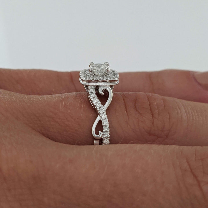 10K WHITE .48 CARAT TOTAL WEIGHT SI2 H DIAMOND PRINCESS CUT (1) ROUND (36) ESTATE HALO TWIST RING 2.8 GRAMS