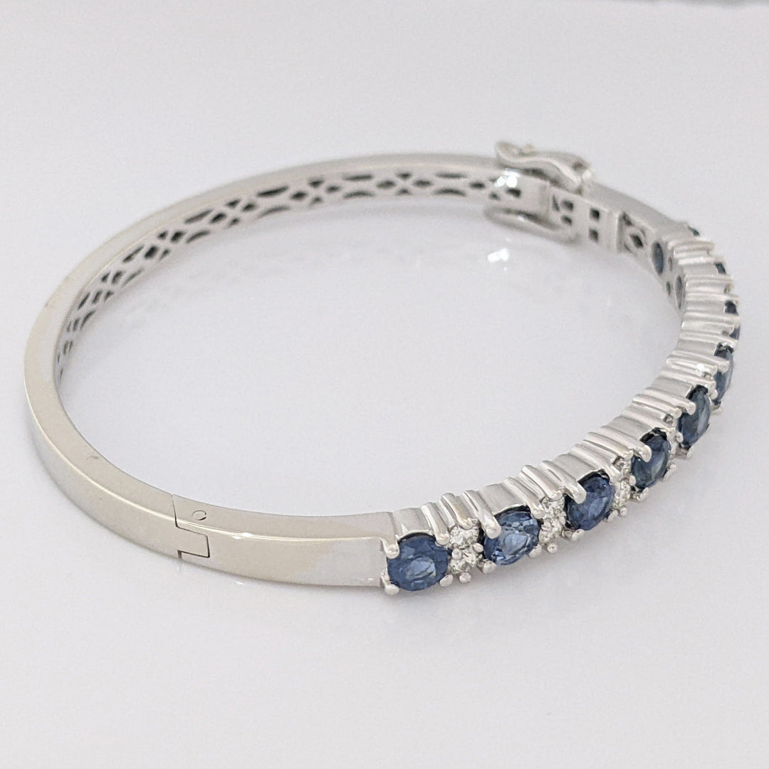 14K SAPPHIRE 4.50 CARAT TOTAL WEIGHT (9) ROUND WITH .71 DIAMOND TOTAL WEIGHT ESTATE BANGLE 23.9 GRAMS