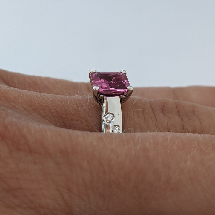 PLATINUM PINK SAPPHIRE PRINCESS CUT 1.41 CARAT TOTAL WITH .12 DIAMOND TOTAL WEIGHT FLUSH SET ESTATE RING 6.0 GRAMS