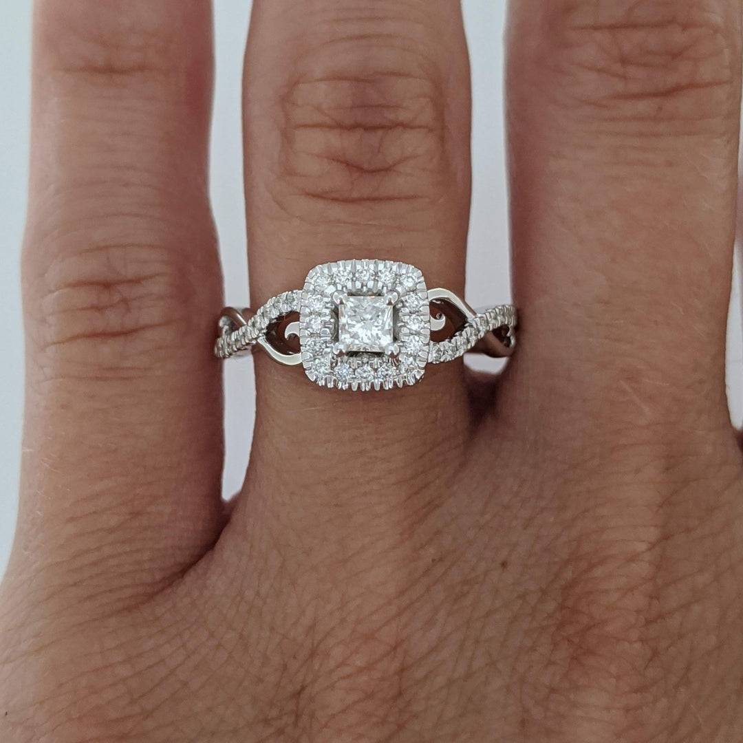 10K WHITE .48 CARAT TOTAL WEIGHT SI2 H DIAMOND PRINCESS CUT (1) ROUND (36) ESTATE HALO TWIST RING 2.8 GRAMS