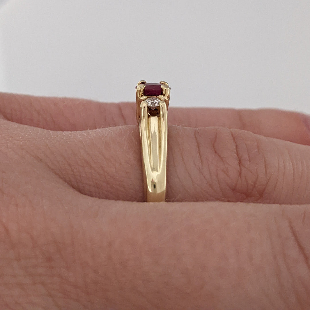 10K RUBY OVAL 4X6 "C" WITH .10 DIAMOND TOTAL WEIGHT (2) ESTATE RING 2.8 GRAMS