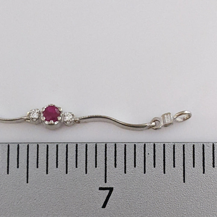 14K WHITE RUBY ROUND (8) 3MM WITH .16 DIAMOND TOTAL WEIGHT (16) ESTATE WAVY BRACELET 4.3 GRAMS