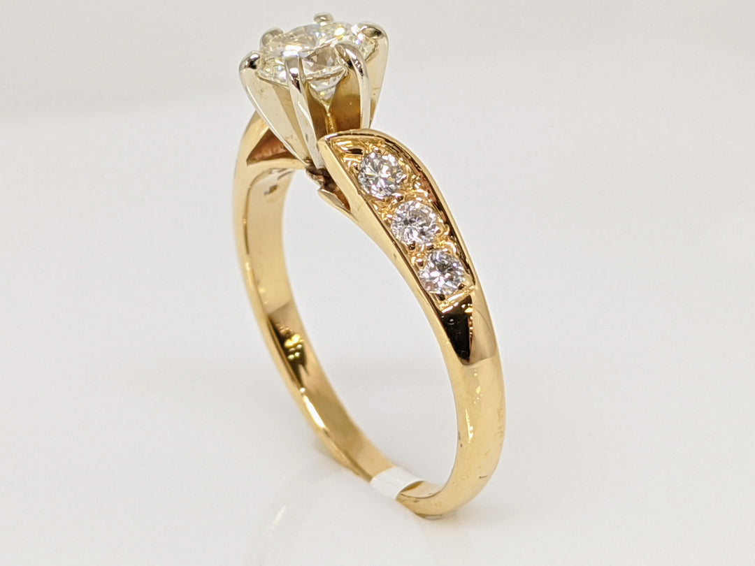 14K .62 CARAT TOTAL WEIGHT VS2 J DIAMOND OVAL WITH (6) ROUND MELEE ESTATE RING