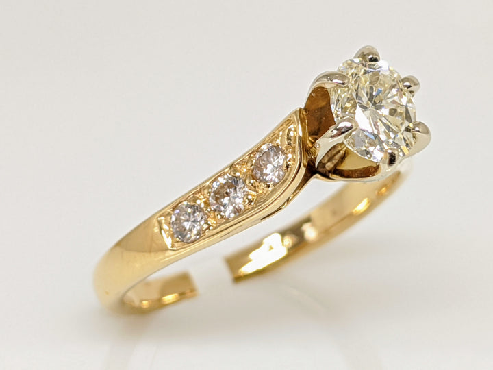 14K .62 CARAT TOTAL WEIGHT VS2 J DIAMOND OVAL WITH (6) ROUND MELEE ESTATE RING