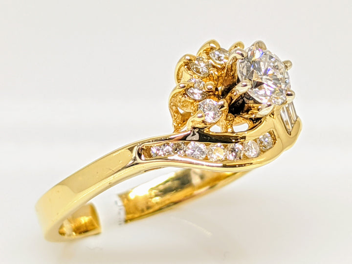 14K .71 CARAT TOTAL WEIGHT SI2-I1 H DIAMOND ROUND WITH BAGUETTE(6) AND MELEE(12) ESTATE RING