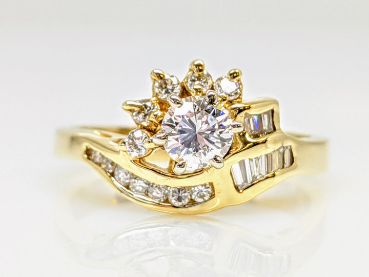 14K .71 CARAT TOTAL WEIGHT SI2-I1 H DIAMOND ROUND WITH BAGUETTE(6) AND MELEE(12) ESTATE RING