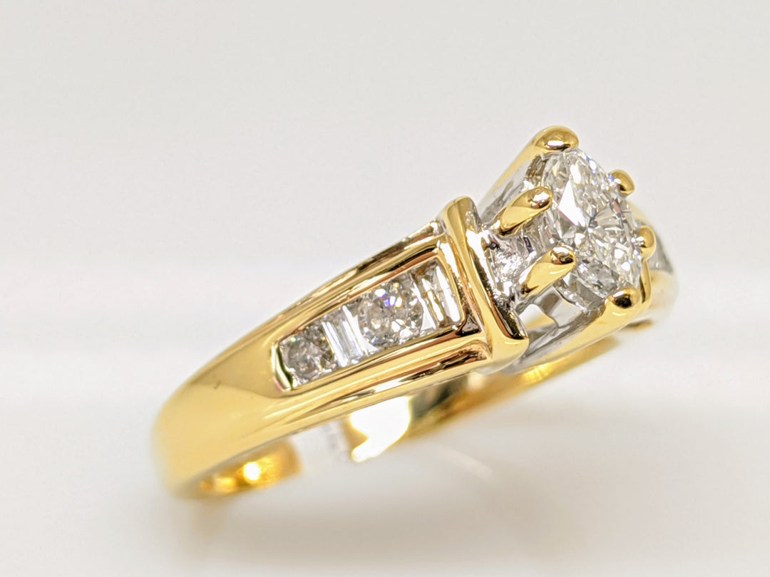 14K .57 CARAT TOTAL WEIGHT SI2 F DIAMOND MARQUISE CUT WITH (4) ROUND AND (4) BAGUETTE CUT ESTATE RING 3.9 GRAMS