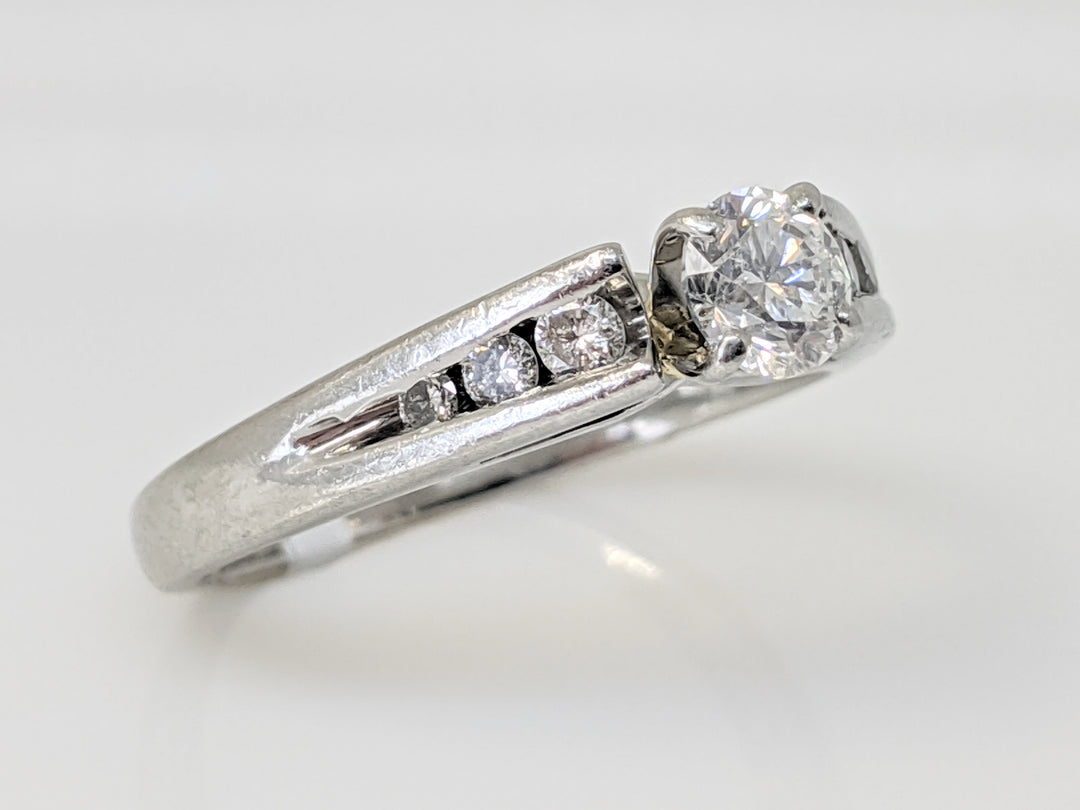 PLATINUM .46 CARAT TOTAL WEIGHT I1 H DIAMOND ROUND (7) ESTATE RING 5.4 GRAMS