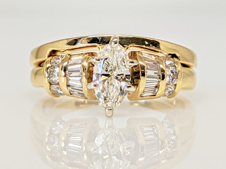 14K .71 CARAT TOTAL WEIGHT VS1-SI1 I DIAMOND MARQUISE CUT WITH (8) BAGUETTE CUT AND (6) ROUND DIAMOND ESTATE SET