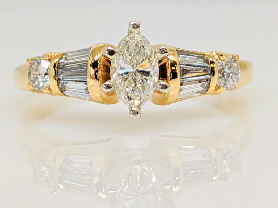 14K .64 CARAT TOTAL WEIGHT SI1 G DIAMOND MARQUISE CUT WITH (6) BAGUETTE CUT AND (2) ROUND MELEE ESTATE RING 3.0 GRAMS