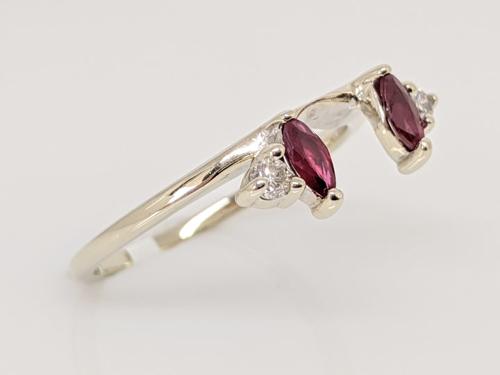 14KW RUBY MARQUISE CUT (2) 2.5X5 WITH .08 DIAMOND TOTAL WEIGHT (2) ROUND ESTATE WRAP 2.0 GRAMS