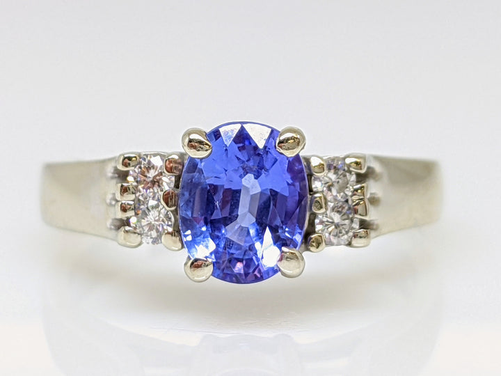14KW TANZANITE OVAL 5X7 WITH .12 DIAMOND TOTAL WEIGHT ESTATE RING 4.9 GRAMS