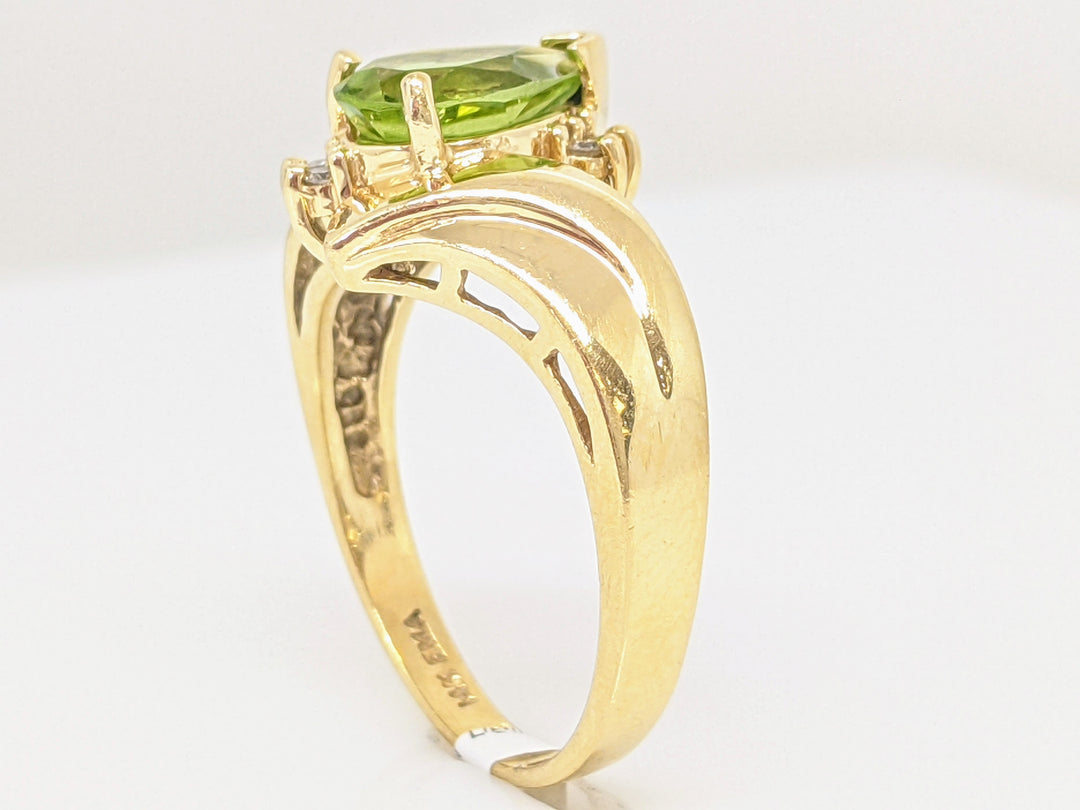 14K PERIDOT PEAR 6X9 WITH (4) MELEE ESTATE RING 5.3 GRAMS