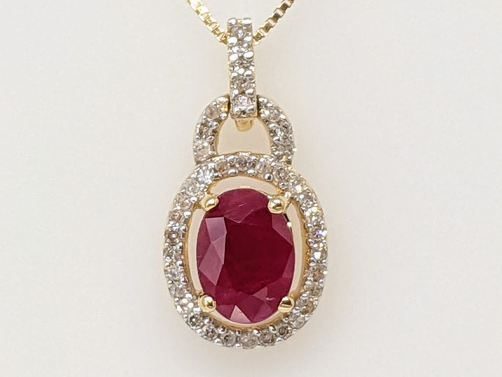 14K RUBY OVAL 6X5 WITH .30 DIAMOND TOTAL WEIGHT ESTATE PENDANT & CHAIN 2.5 GRAMS