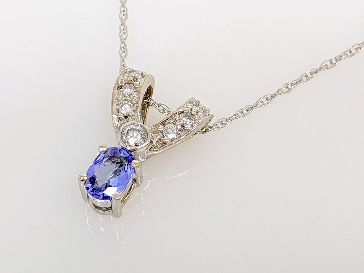 14KW TANZANITE OVAL 4X6 WITH 7 MELEE ESTATE PENDANT & CHAIN 2.8 GRAMS