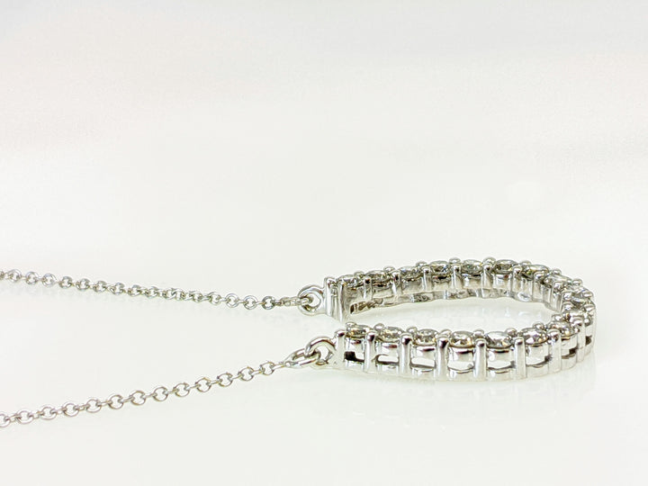 14KW 1.00 CARAT TOTAL WEIGHT I1 J-K DIAMOND ROUND (18) HORSESHOE ESTATE PENDANT & CHAIN 3.8 GRAMS