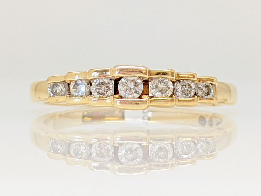 14K .70 CARAT TOTAL WEIGHT I1 L DIAMOND ROUND (7) CHANNEL SET ESTATE BAND 2.4 GRAMS