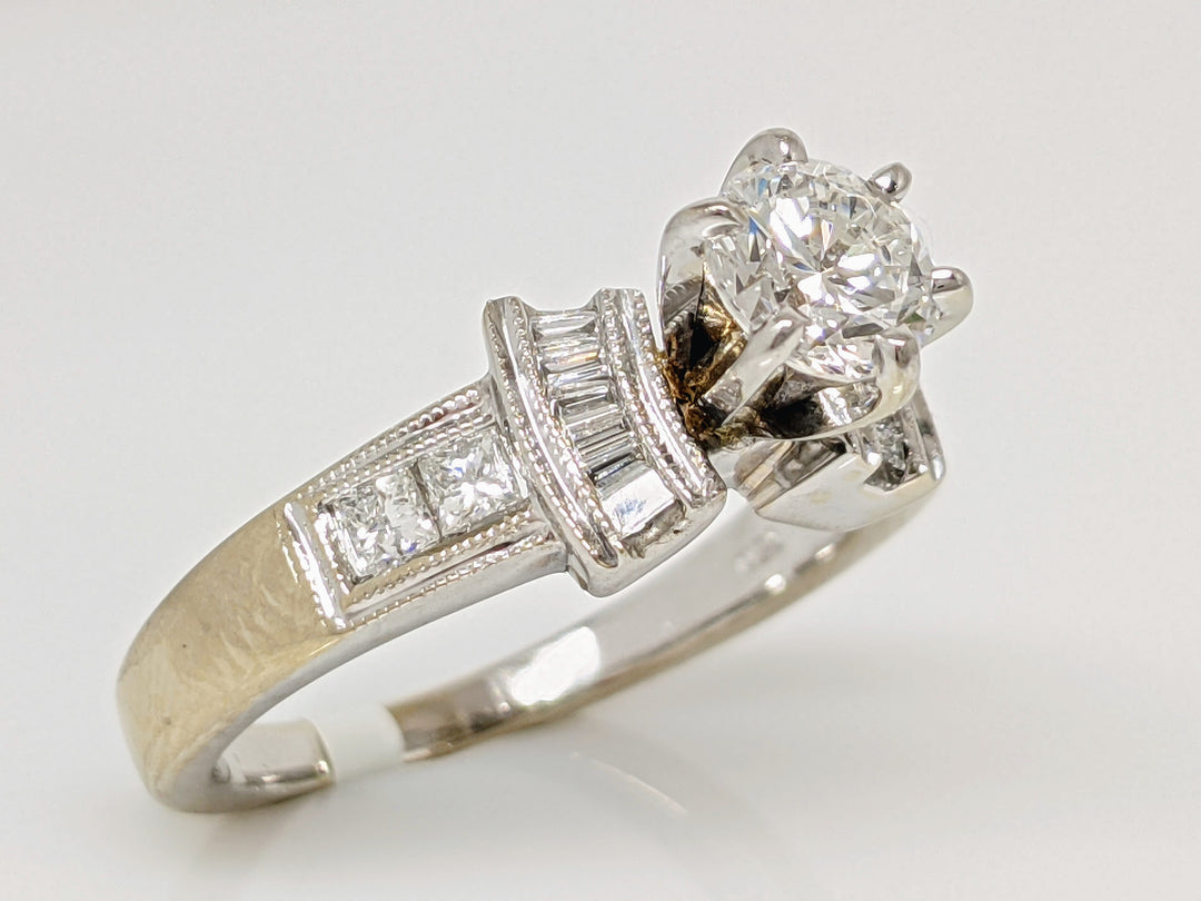 18KW .70 CARAT TOTAL VS2 E DIAMOND ROUND WITH (12) BAGUETTE CUT AND (4) PRINCESS CUT ESTATE RING 5.4 GRAMS