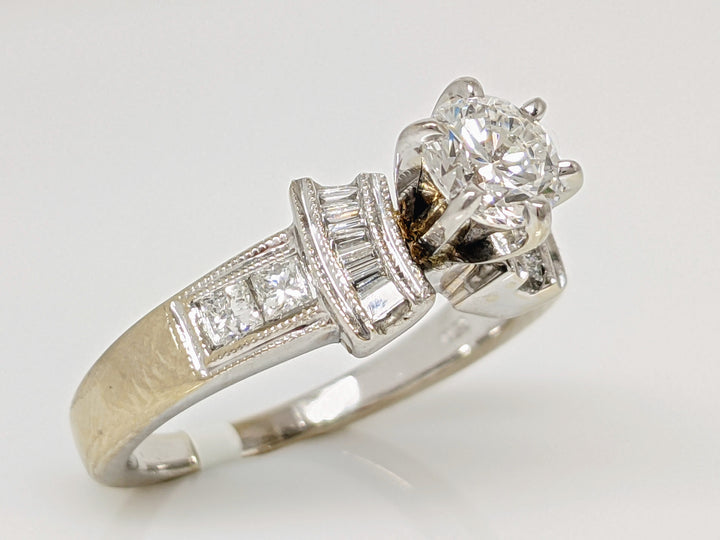18KW .70 CARAT TOTAL VS2 E DIAMOND ROUND WITH (12) BAGUETTE CUT AND (4) PRINCESS CUT ESTATE RING 5.4 GRAMS