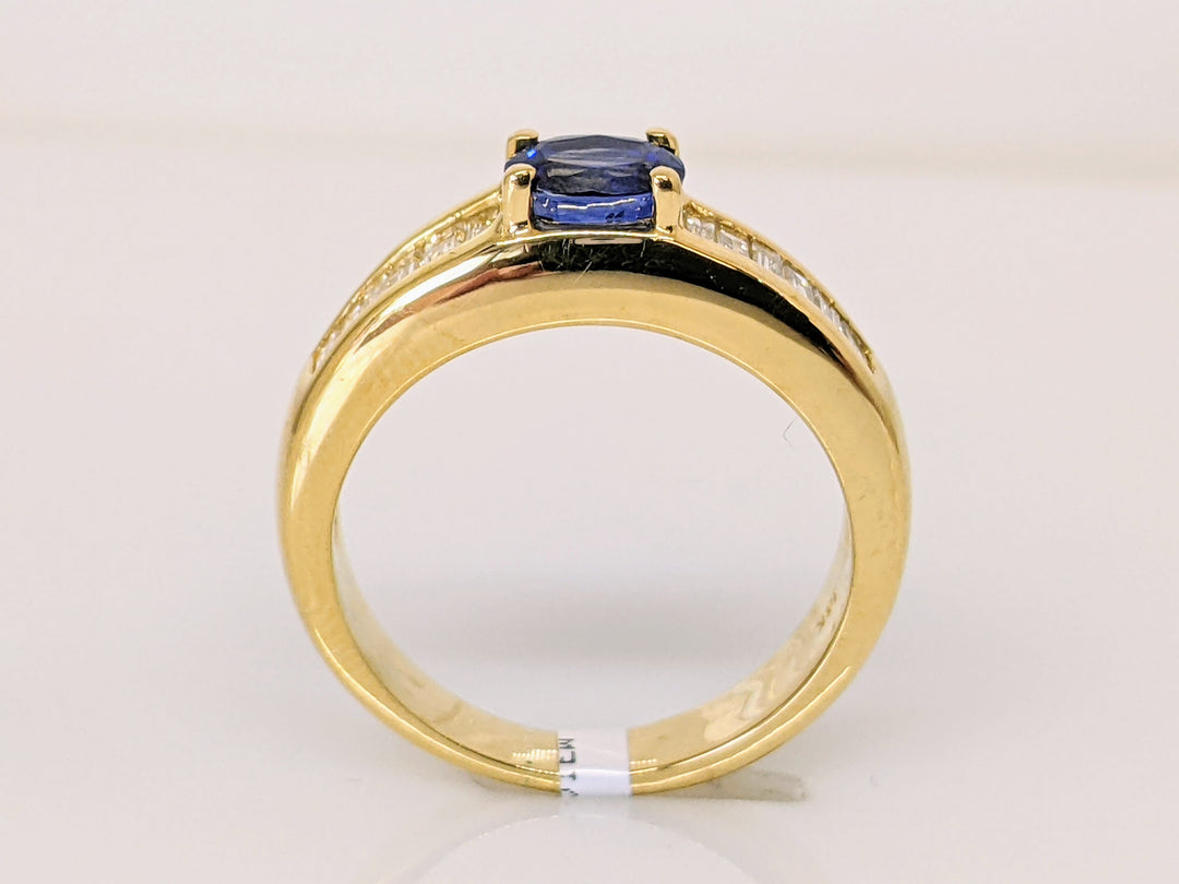 18K SAPPHIRE "AA" OVAL 4X5 WITH (12) BAGUETTE .60 DIAMOND TOTAL WEIGHT ESTATE RING 5.8 GRAMS