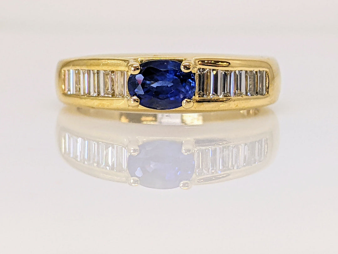 18K SAPPHIRE "AA" OVAL 4X5 WITH (12) BAGUETTE .60 DIAMOND TOTAL WEIGHT ESTATE RING 5.8 GRAMS