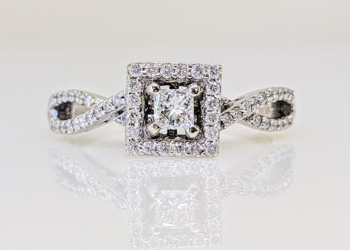 14K WHITE .82 CARAT TOTAL WEIGHT I1 I DIAMOND PRINCESS CUT WITH (56) ROUND MELEE ESTATE RING 4.0 GRAMS