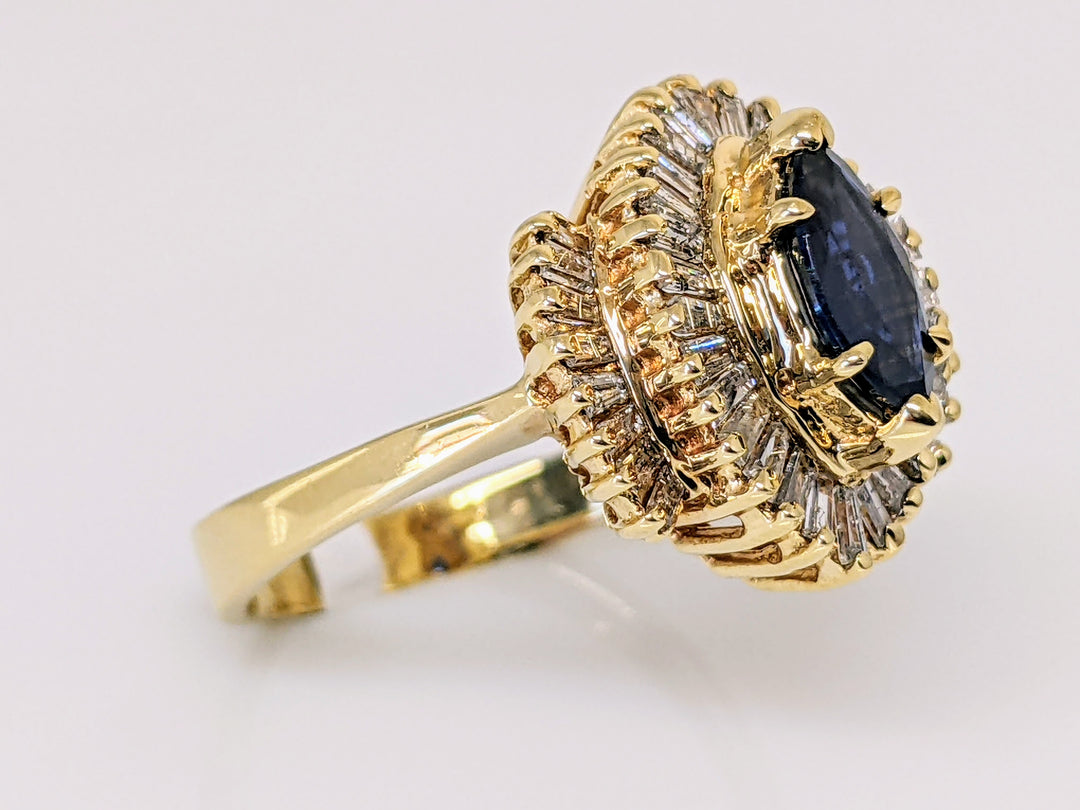 14K SAPPHIRE MARQUISE 4X9 WITH DIAMOND BAGUETTES 1.35 TOTAL CARAT WEIGHT ESTATE RING
