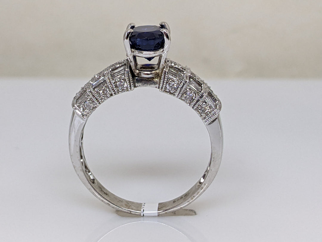 14KW SAPPHIRE OVAL 6X8 WITH .60 DIAMOND TOTAL WEIGHT (24) ROUND (12) BAGUETTE  ESTATE RING 4.6 GRAMS