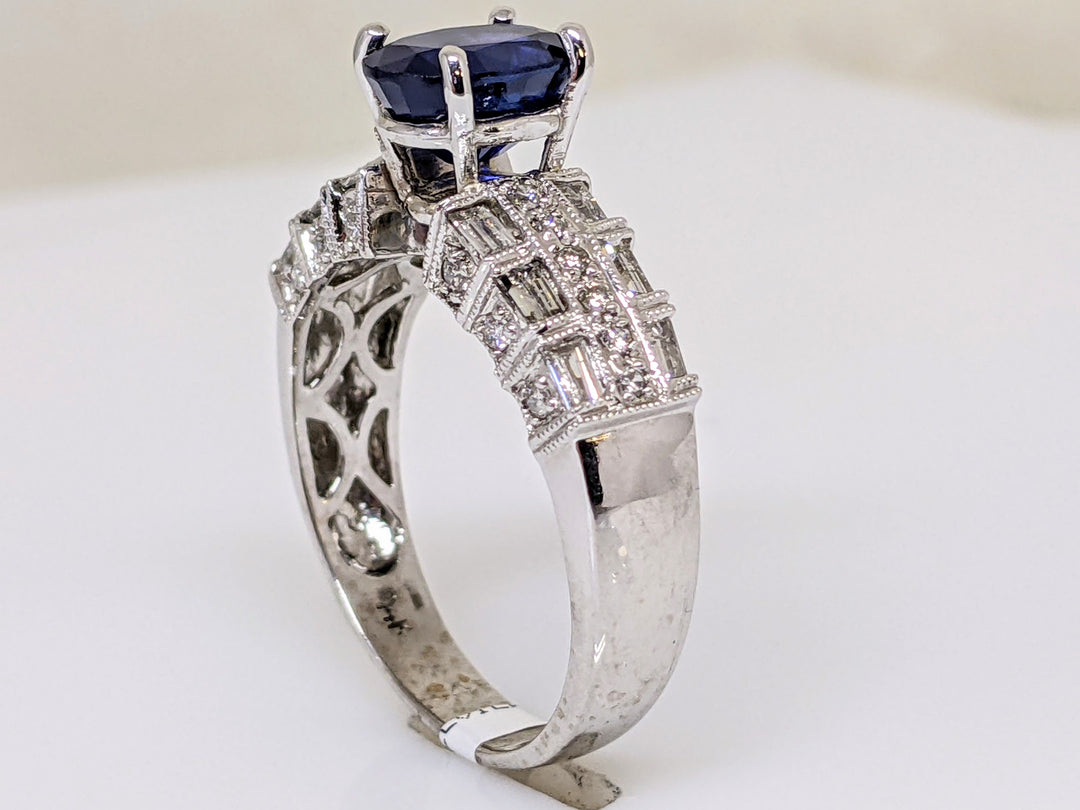 14KW SAPPHIRE OVAL 6X8 WITH .60 DIAMOND TOTAL WEIGHT (24) ROUND (12) BAGUETTE  ESTATE RING 4.6 GRAMS