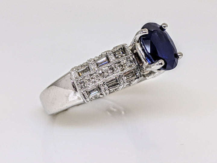 14KW SAPPHIRE OVAL 6X8 WITH .60 DIAMOND TOTAL WEIGHT (24) ROUND (12) BAGUETTE  ESTATE RING 4.6 GRAMS