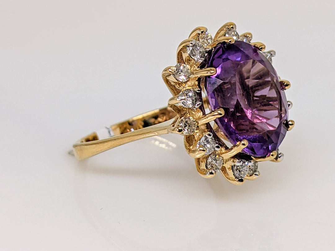 14K AMETHYST OVAL 10X12 WITH (16) ROUND .48 CARAT TOTAL WEIGHT ESTATE RING 4.7 GRAMS